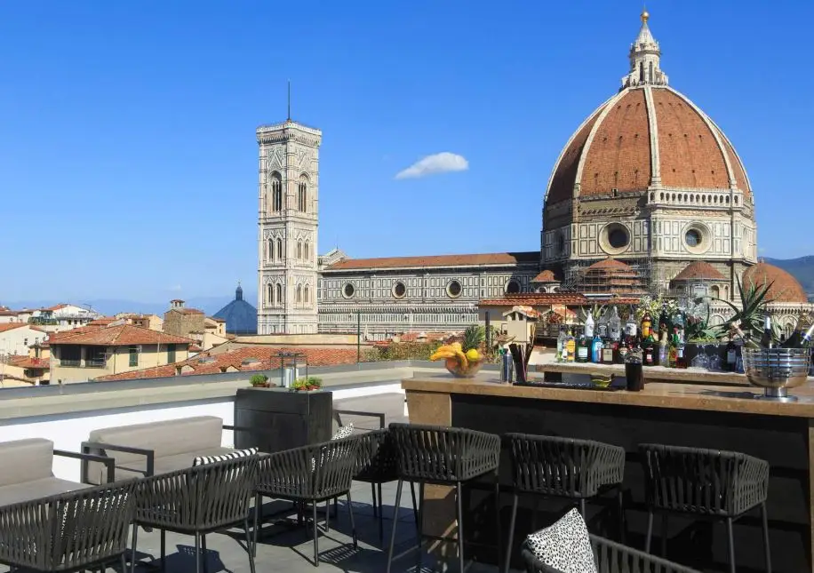 Divina Terrazza (Grand Hotel Cavour ) rooftop bar offers panoramic view